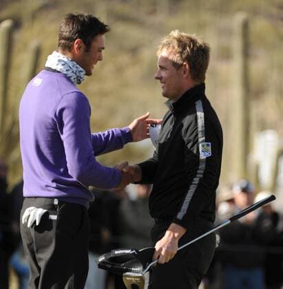 Martin Kaymer (L) of Germany congratulates Luke Donald (R) of England after Donald defeated Kaymer at the WGC-Accenture Match Play Championship at Dove Mountain Golf Course in Marana, AZ -  PXP2011022715