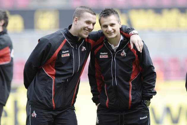 1. FC Köln vs. 1. FSV Mainz 05 . Lukas Podolski (Koeln) links und Slawomir Peszko (Koeln) rechts gut gelaunt o0 Freude