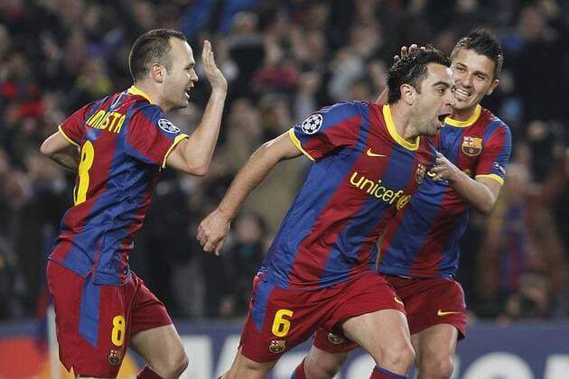 FC Barcelona s Xavi Hernandez (c), Andres Iniesta (L) and David Villa celebrate goal during UEFA Champions League match.March 8,2011.  (201103081465) o0 Barca, Jubel, Freude,