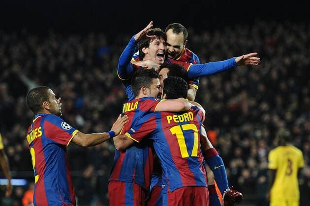 Football - UEFA Champions League - Barcelona FC (red) vs. Arsenal FC London (yellow) - Lionel Messi (up L) and Andres Iniesta (up R) of Barcelona celebrates scoring their third goal at the Camp Nou, Barcelona  o0 Jubel, Freude,