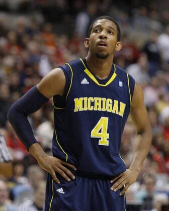 March 12, 2011: Michigan Wolverines guard Darius Morris (4) during the Big Ten Men s basketball tournament at Conseco Fieldhouse in Indianapolis, IN. In the first half of the semi-final game between Michigan and Ohio State. - ZUMAc04