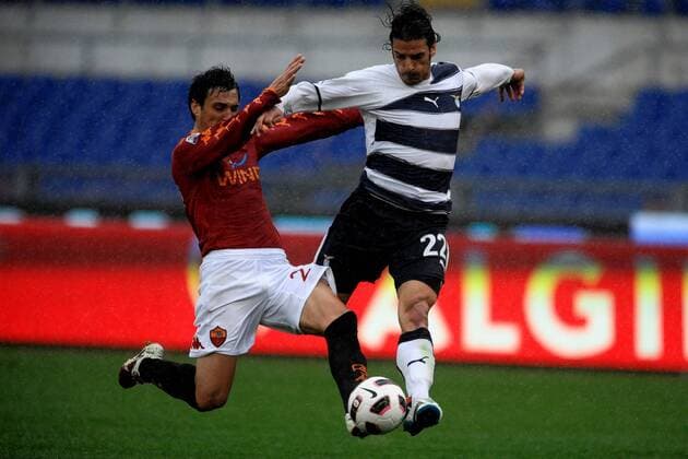Guillermo BURDISSO (AS), Sergio FLOCCARI (Lazio), AS Rom (rot) - Lazio Rom (schwarz weiß) andreaxstaccioli