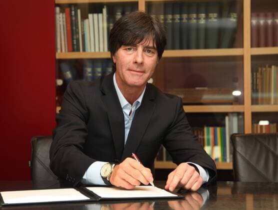 German football national coach Joachim Löw signs a contract at the headquarters of the German Football Association (DFB) in Frankfurt am Main, Germany - 
