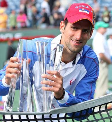 Novak Djokovic of Serbia holds the championship trophy after winning his mens final match at the BNP Paribas Open in Indian Wells, California on March 20, 2011.  IDW20110320713 o0 Sieg Siegerehrung Trophäe Pokal Objekte Freude
