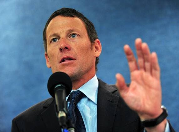 Lance Armstrong (USA) delivers remarks at a press conference held to urge Congress to oppose cuts to cancer research and prevention programs, in Washington on March 24, 2011.  WAP20110324311