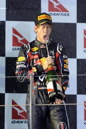 Sebastian VETTEL (GER Red Bull Racing) - Sieger des GP von Australien 2011 Formel 1: GP von Australien, Melbourne. o0 Siegerehrung Sieg, Sieger Jubel, Freude Sekt, Sektdusche, Champagner, Champagnerdusche