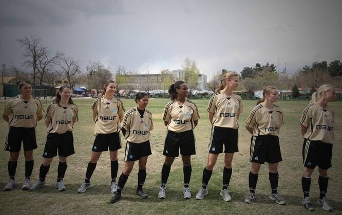 Players of NATO-led International Security Aid Force women s soccer team line up preparing to play against Afghan women s national soccer team in a friendly match in Kabul, capital of Afghanistan, on April 1, 2011. The match ended with a 0-0 tie. 