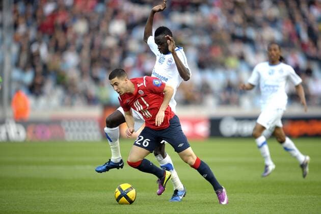 Lille OSC (rot) vs. SM Caen (weiß) --- Eden Hazard (vorn) Ismaila N Diaye  JBAutissier o0 Ndiye