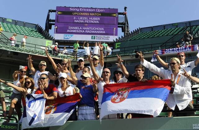 Serbian fans of mens singles tennis winner Novak Djokovic (SRB) at the Sony Ericsson Open Tennis Center at Crandon Park - ZUMAsd3 o0 Fahne, Landesfahne Objekte Fan, Zuschauer Jubel, Freude Totale