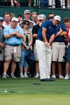 Humble, Texas, Phil Mickelson (USA) putts the ball for a birdie in hole-1 to start the final round of the Shell Houston Open. - ZUMAq99