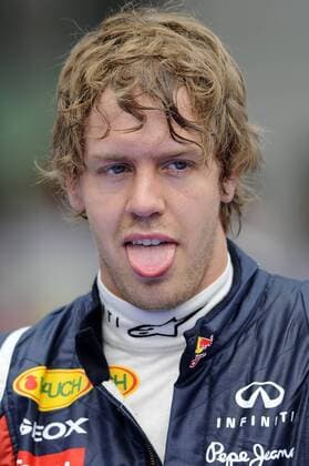 Sebastian VETTEL (GER),Red Bull Racing,Aktion,,Einzelbild,angeschnittenes Einzelmotiv,Portraet,Brustbild,streckt seine Zunge heraus,winner,Sieger.Qualifying. Formel 1:GP von Malaysia Sepang Circuit Kuala Lumpur,Saison2011,