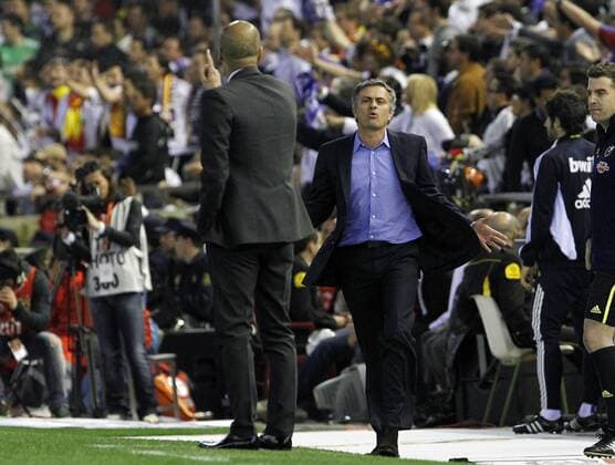 FC Barcelona s coach (l) coach Pep Guardiola (l) and Real Madrid s coach Jose Mourinho have words --- Final Copa del Rey - FC Barcelona (Barca) vs Real Madrid.  (20110420897) o0 Josep