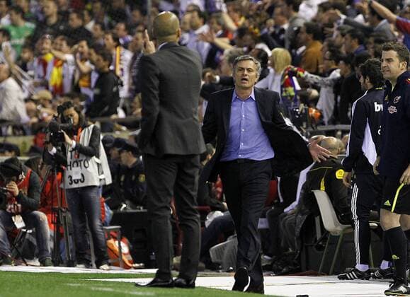 FC Barcelona s coach (l) coach Pep Guardiola (l) and Real Madrid s coach Jose Mourinho have words --- Final Copa del Rey - FC Barcelona (Barca) vs Real Madrid.  (125240) o0 Josep