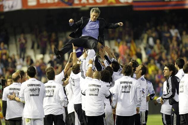 Spain King s Cup final 2011 Real Madrid (white) vs FC Barcelona Barca (red): Cup Winner Real Madrid celebrate coach Jose Mourinho 
