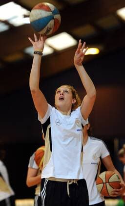 COLOGNE, GERMANY - APRIL 21: Kim Kulig throws the ball during a Basketball training session at the German Women National Team training camp at Ballpark Köln on April 21, 2011 in Cologne, Germany. Kim Kulig o0 DFB