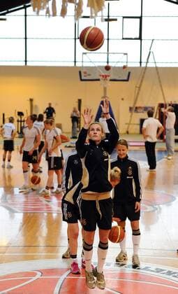 COLOGNE, GERMANY - APRIL 21: Simone Laudehr throws the ball during a Basketball training session at the German Women National Team training camp at Ballpark Köln on April 21, 2011 in Cologne, Germany. Simone Laudehr  o0 DFB