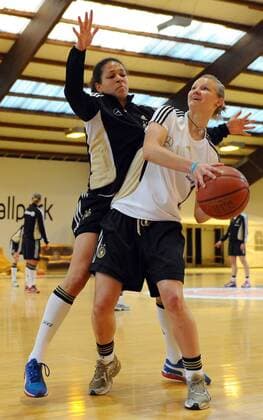 COLOGNE, GERMANY - APRIL 21: Celia Okoyino da Mbabi (L) challenges Alexandra Popp during a Basketball training session at the German Women National Team training camp at Ballpark Köln on April 21, 2011 in Cologne, Germany. Celia Okoyino da Mbabi; Alexandra Popp o0 DFB