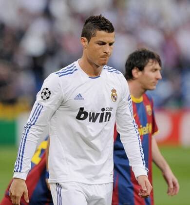 FUSSBALL CHAMPIONS LEAGUE SAISON 2010 2011 Halbfinale 27.04.2011, Real Madrid CF - FC Barcelona; Cristiano Ronaldo (li, Real Madrid) enttaeuscht mit Lionel Messi (Barca) 
