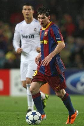 Football. FC Barcelona (Barca red) vs Real Madrid (white) soccer match at Camp Nou Stadium. Barcelona s Lionel Messi and Real Madrid s Cristiano Ronaldo during the UEFA Champions League semifinals soccer match. May, 3, 2011. 
