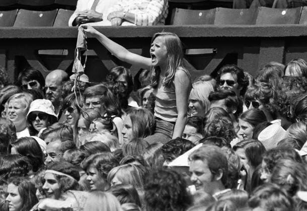 Tennis - Wimbledon Championships 1975 . Centre Court. A young female Borg fan offers her bra to Björn Borg enters Centre Court.  o0 All England Championships