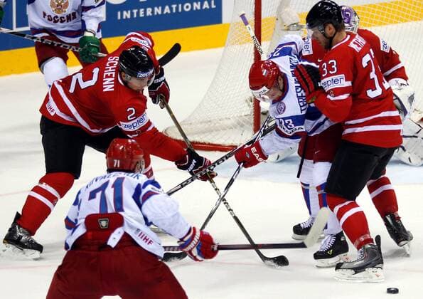 EISHOCKEY - IIHF WM 2011, CAN vs RUS BRATISLAVA,SLOWAKEI,12.MAI.11 - DIVERS, EISHOCKEY - IIHF Weltmeisterschaft, Laenderspiel, Viertelfinale, Kanada vs Russland. Bild zeigt Ilya Kovalchuk (RUS), Luke Schenn (CAN), Alexei Tereshenko (RUS) und Marc Methot (CAN). 