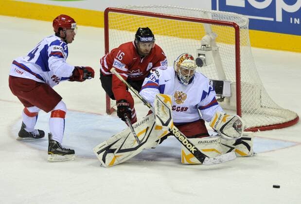 IIHF World Championship Slovakia 2011, Bratislava, May 12, 2011, quarterfinal, Canada vs. Russia. Left to right: Alexej Jemelin (RUS), Andrew Ladd (CAN) and goalie Konstantin Barulin (RUS). (CTKxPhoto JanxKoller)  CTKPhoto20174679