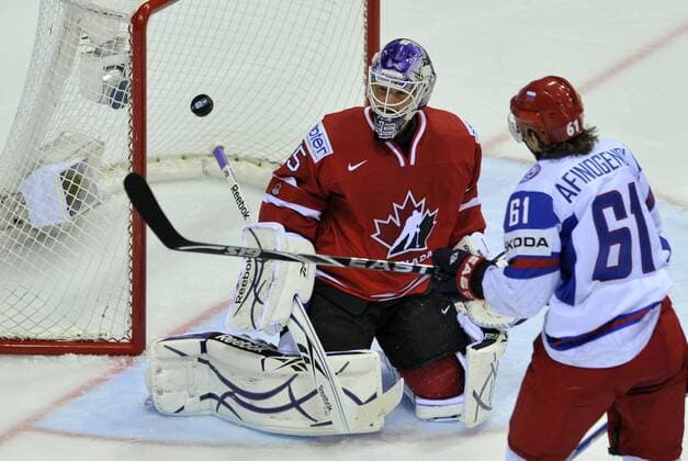 IIHF World Championship Slovakia 2011, Bratislava, May 12, 2011, quarterfinal, Canada vs. Russia. Left to right: Jonathan Bernier (CAN) and Maxim Afinogenov (RUS). (CTKxPhoto JanxKoller)  CTKPhoto20174680