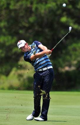 Nick Watney hits his second shot approach on the 7th hole from the fairway during the first round of The Players Championship Thursday May 12, 2011 on the Stadium Course at TPC Sawgrass in Ponte Vedra Beach, Florida. Watney made a birdie putt one shot later to mover to 8 under par and sole possession of the first round lead. UPI Photo Rick Wilson  JAX2011051210