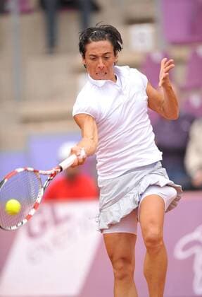 Francesca Schiavone from Italy plays a return during the women s singles quarterfinal match at WTA Tennis Damen Brussels Open tennis tournament in Brussels, Belgium, on May 19, 2011. 