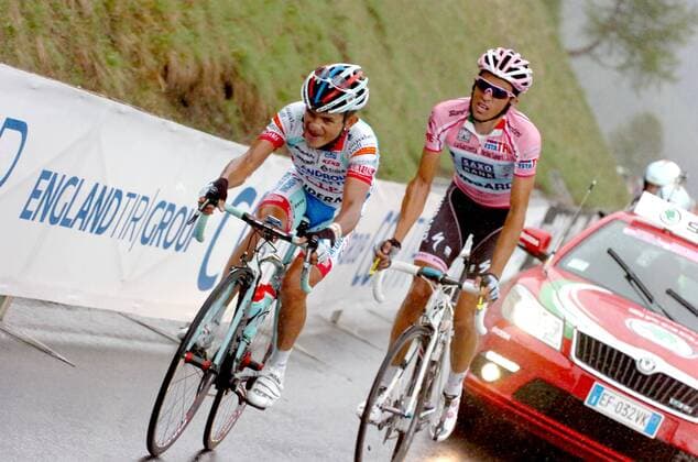 Giro d Italia, 13. Etappe: Spilimbergo - Grossglockner --- Jose Rujano Guillen (Androni Giocattoli, li.) vor Alberto Contador (Saxo Bank Sungard)  o0 Werbebande Bande Sponsor Werbung Wirtschaft England TIR Group