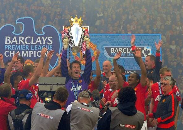 Edwin van der Sar of Manchester United holds up the Premier League Trophy - Barclays Premier League, Manchester United ManU v FC Blackpool 22nd May, 2011 EDITORIAL USE ONLY. No use with unauthorised audio, video, data, fixture lists, club league logos or live services. Online in-match use limited to 120 images, no video emulation. No use in betting, games or single club league player publications.