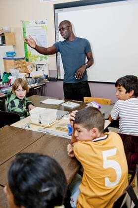 Brussels, Belgium May 25, 2011 Lilian Thuram supports an action against racism with local schoolchildren 