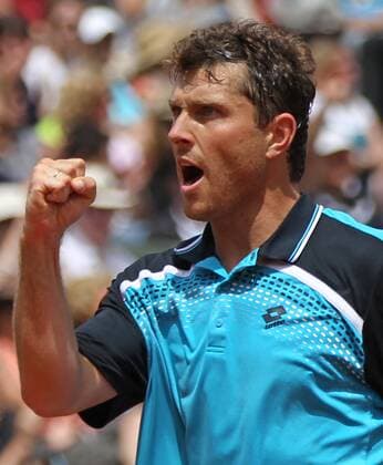 German Michael Berrer reacts after a shot during his French Open mens third round match at Roland Garros in Paris on May 28, 2011. Murray defeated Berrer 6-3, 6-2, 6-3 to advance to the fourth round.  PAR20110528701