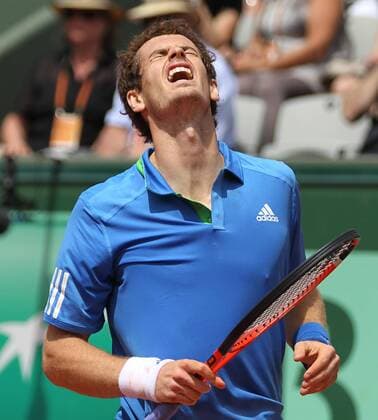 Andy Murray of Great Britain reacts after a shot during his French Open mens third round match at Roland Garros in Paris on May 28, 2011. Murray defeated Berrer 6-3, 6-2, 6-3 to advance to the fourth round.  PAR20110528717 o0 Andrew