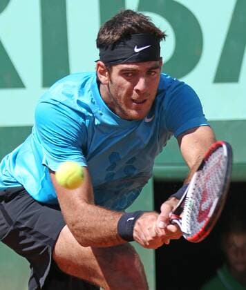 Juan Martin del Potro of Argentina hits a shot during his French Open mens third round match at Roland Garros in Paris on May 28, 2011. Djokovic defeated del Potro 6-3, 3-6, 6-3, 6-2 to advance to the fourth round.  PAR20110528748