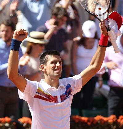 Novak Djokovic of Serbia celebrates after winning his French Open mens third round match at Roland Garros in Paris on May 28, 2011. Djokovic defeated del Potro 6-3, 3-6, 6-3, 6-2 to advance to the fourth round.  PAR20110528763