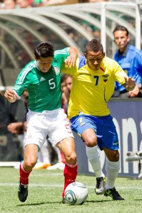 May 28, 2011 - Seattle, Washington, U.S - Mexico defender Ricardo Osorio (5) and Ecuador midfielder Michael Arroyo (7) fight for the ball at Qwest Field in Seattle, Washington. The game ended in a 1-1 tie. FMF U.S. Tour 2011 - May 28 - Ecuador at Mexico - ZUMAy19