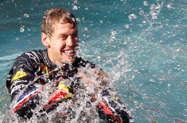FORMEL 1 - GP von Monaco MONTE CARLO,MONACO,29.MAI.11 - MOTORSPORT, FORMEL 1 - Grand Prix von Monaco, Siegerehrung. Bild zeigt den Jubel von Sebastian Vettel (GER Red Bull Racing). Keywords: Pool.  o0 Wasser nass kurios Sieg