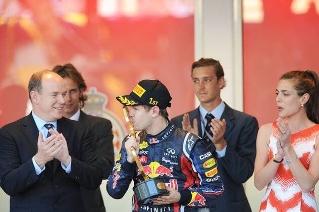 MONACO FORMULA ONE GRAND PRIX . PODIUM CEREMONY FOR WINNER,RED BULL DRIVER SEBASTIAN VETTEL HERE WITH PRINCE ALBERT II OF MONACO AND NIECE CHARLOTTE CASIRAGHI - F1 MONACO - COURSE - GRAND PRIX 2011 xBERNARDSt EtienneTx  o0 Sieg Siegerehrung Adel people