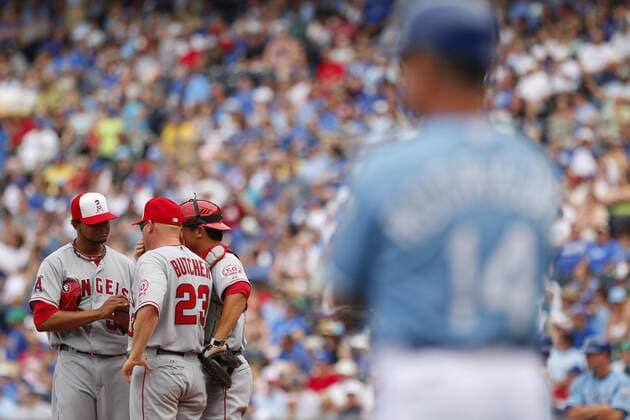 May 30, 2011: Pitching coach Mike Butcher 23 meets with pitcher Ervin Santana 53 and catcher Hank Conger 16 during the MLB Baseball Herren USA game between the Los Angeles Angels and the Kansas City Royals at Kauffman Stadium in Kansas City MO MLB Baseball Herren USA 2011: Angels vs Royals MAY 30 - ZUMAc04