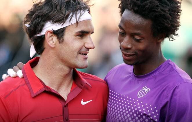 TENNIS - ATP, French Open 2011 PARIS,FRANKREICH,31.MAI.11 - TENNIS - ATP Tennis Herren World Tour, Grand Slam, Roland Garros, French Open. Bild zeigt Roger Federer (SUI) und Gael Monfils (FRA). 
