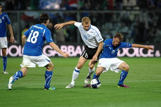 Riccardo Montolivo Italy, Ragnar KLAVAN Estonia, Claudio MARCHISIO Italy --- Italy vs. Estonia in Modena Andreaxstaccioli