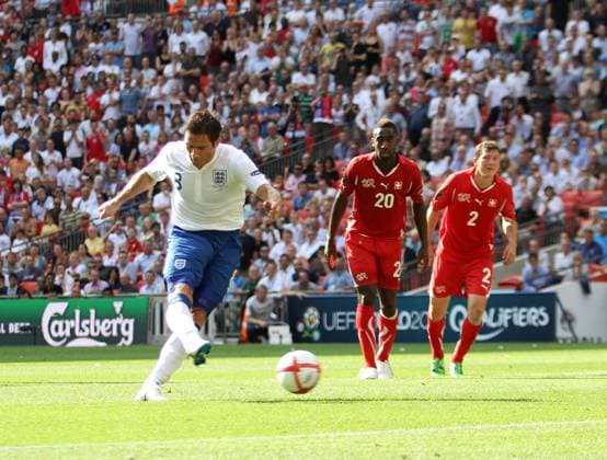 Englands Frank Lampard scoring his sides opening goal European Championship Qualifying Group G England v Switzerland 4th June, 2011 EDITORIAL USE ONLY. No use with unauthorised audio, video, data, fixture lists, club league logos or live services. Online in-match use limited to 120 images, no video emulation. No use in betting, games or single club league player publications.