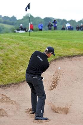 05.06.2011 Day four of the SAAB Wales Open Golf from Celtic Manor. Peter HANSON (SWE) chips from a bunker on the 1st during the fourth and final round on the Twenty Ten course. xRoganxThomsonx  ActionPlus11179402 Content restricted for UK based newspaper