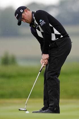 05.06.2011 Day four of the SAAB Wales Open Golf from Celtic Manor. Peter HANSON (SWE) putts on the 1st during the fourth and final round on the Twenty Ten course. xRoganxThomsonx  ActionPlus11179404 Content restricted for UK based newspaper
