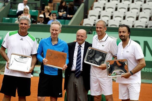 05.06.2011, Paris, France - Runners up Andres Gomez (ECU) (L) and John McEnroe (USA) with Bernard Giudicelly, winners Guy Forget (FRA) (4th from end) and Henri Leconte(FRA) (R) in the Men s Legends Over 45 final at Roland Garros. All 4 players with theor trophies for 1st and second place. xMichaelxCullenx  ActionPlus11179428 Content restricted for UK based newspaper