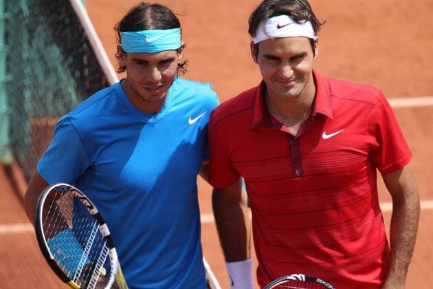 (110605) -- PARIS, June 5, 2011 -- Roger Federer (R) of Switzerland and Rafael Nadal of Spain pose prior to their men s final in the French Open tennis championship at the Roland Garros stadium in Paris June 5, 2011. 