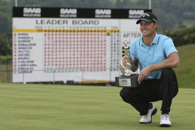 05.06.2011 SAAB Welsh Open Golf from Celtic Manor Twenty Ten Course South Wales. ALEXANDER NOREN wins the SAAB Welsh Open 2011 in front of the leader board xDavidxLloydx  ActionPlus11179793 Content restricted for UK based newspaper