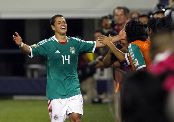 05 June 2011: Mexico forward Javier Chicharito Hernandez (14) after scoring during the 5-0 Mexico victory over El Salvador in the first round of the CONCACAF Gold Cup game played at Cowboys Stadium in Arlington, TX SOCCER: JUN 05 CONCACAF Gold Cup - First Round - Mexico v El Salvador Icon1106050128 EDITORIAL USE ONLY