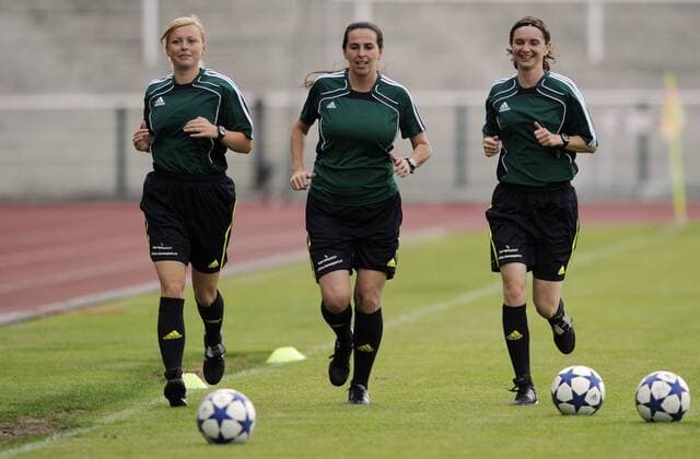 For the first time in history of professional soccer competitions in the Czech Republic was a soccer match supervised by exclusively three women referees. Dagmar Damkova (middle) Adriana Secova and Lucie Ratajova (re.) during 29th round of the 2nd Czech soccer league Dukla Prague vs Zlin on June 4, 2011. (CTKxPhoto MichalxKamaryt)  CTKPhoto1201106040432001 o0 Schiedsrichtergespann Linienrichter